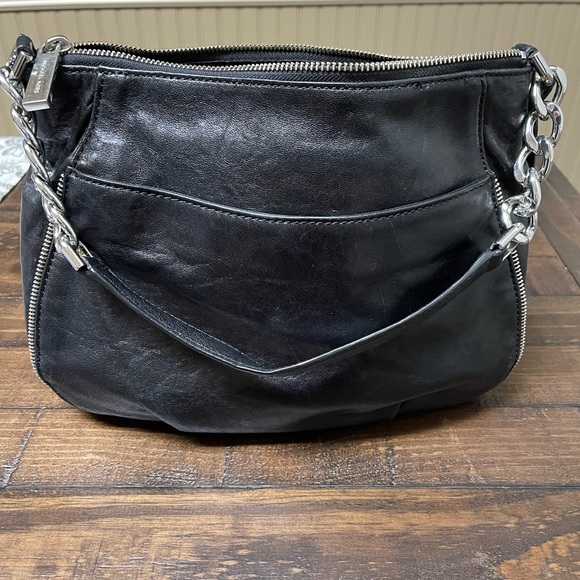 Michael Kors Black and Silver Chain and zippers Bag. - Picture 2 of 7